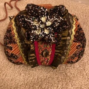 Elegant Beaded Clutch with Floral Design